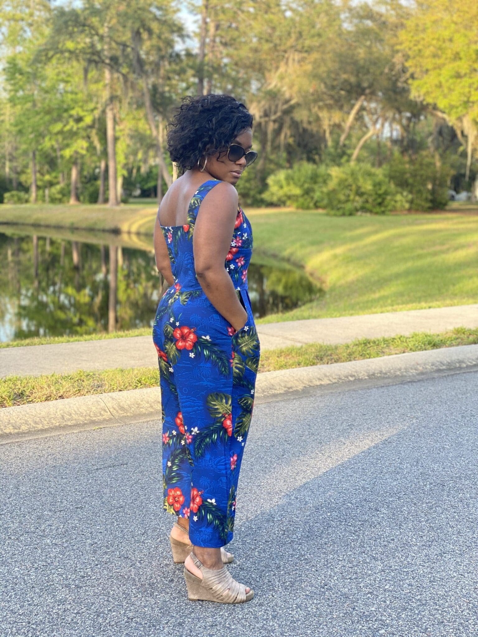 McCalls Natala jumpsuit M8101 African American woman standing the road wearing McCalls 8101