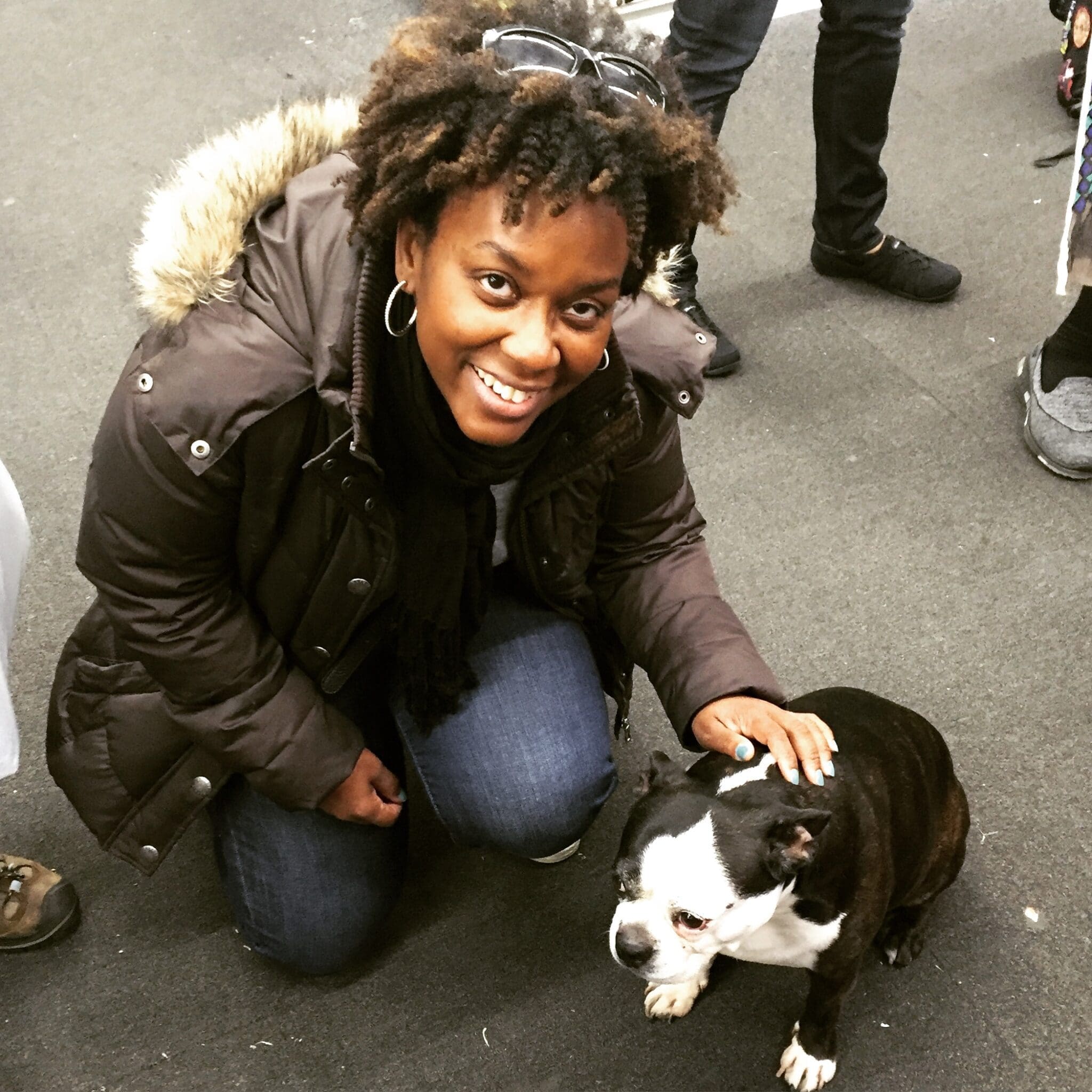 Mood fabric stores review: Shontae posing with Swatch the Boston Terrier at Mood Fabrics NYC