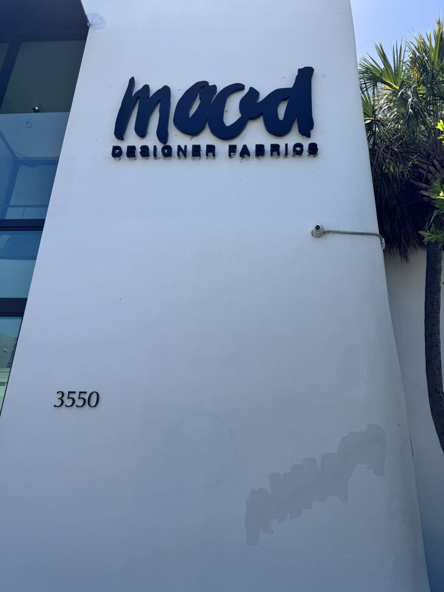 Mood fabric stores review: The vibrant storefront signage of Mood Fabrics Miami