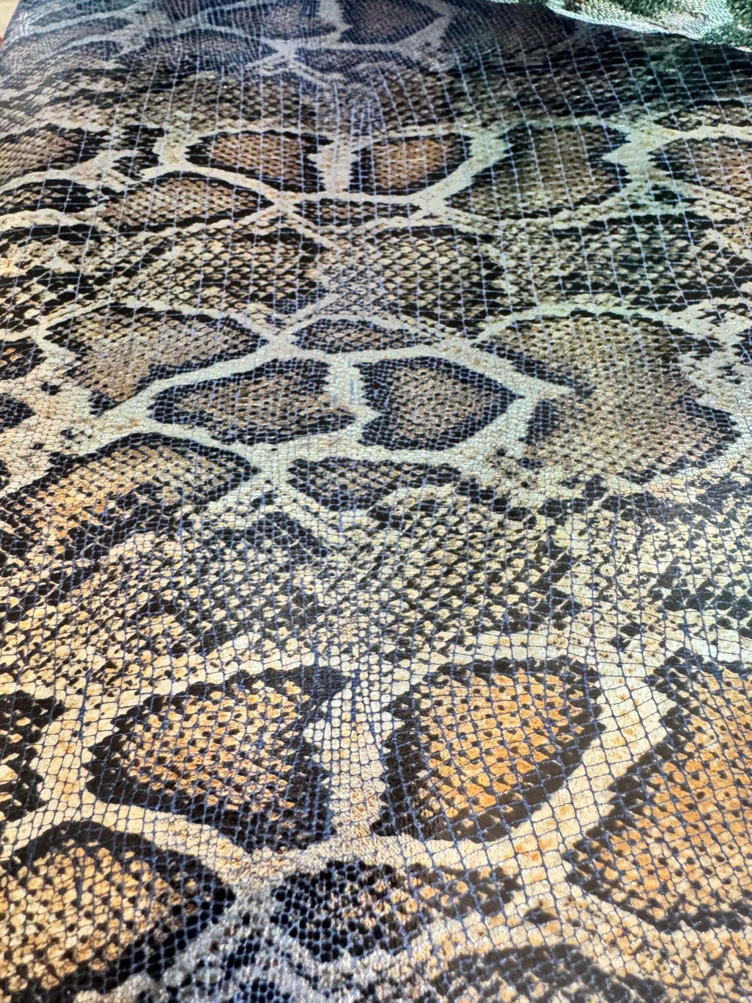 Leopard print stretch denim fabric sourced in Paris for a bespoke moto jacket