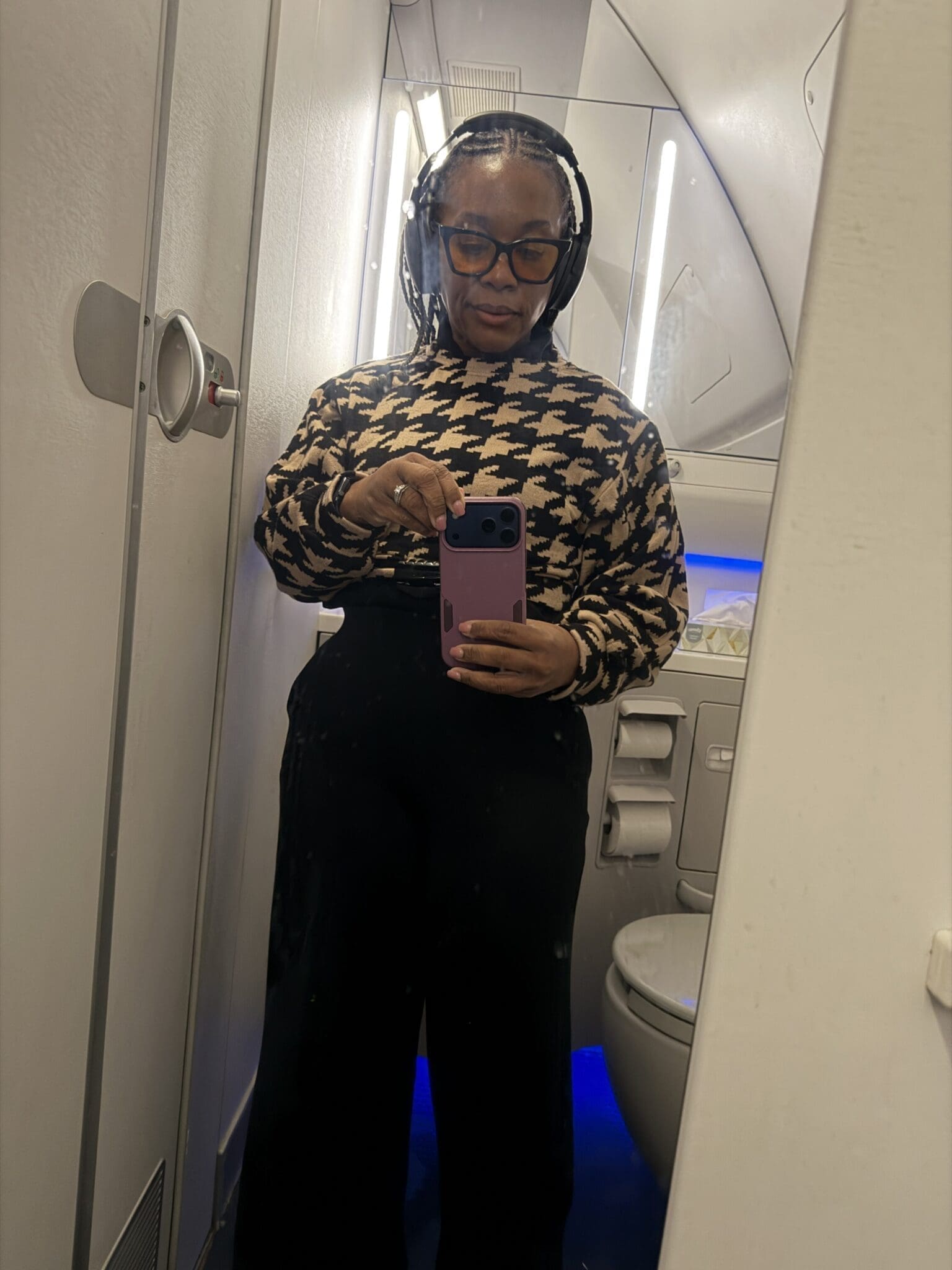Restroom selfie showcasing the Spanx jumpsuit fit