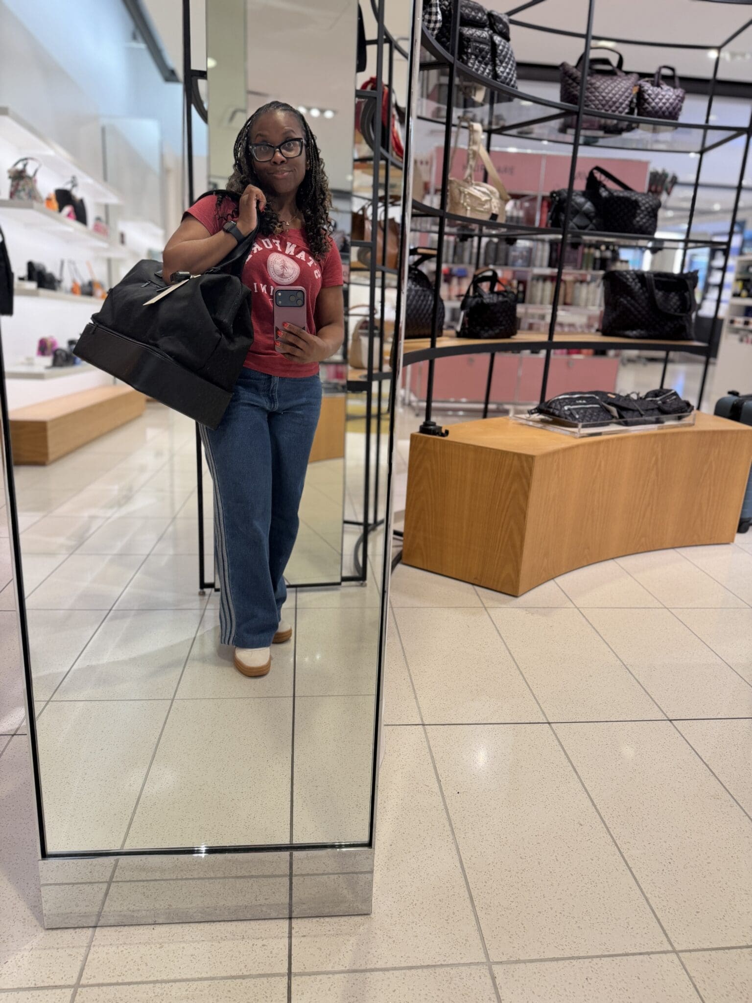 Mirror selfie showing BÉIS Weekender overwhelming a petite frame