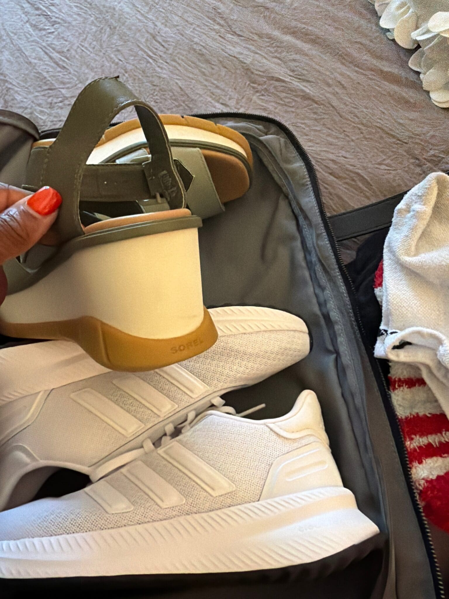 Interior view of Away Weekender showing three pairs of shoes packed