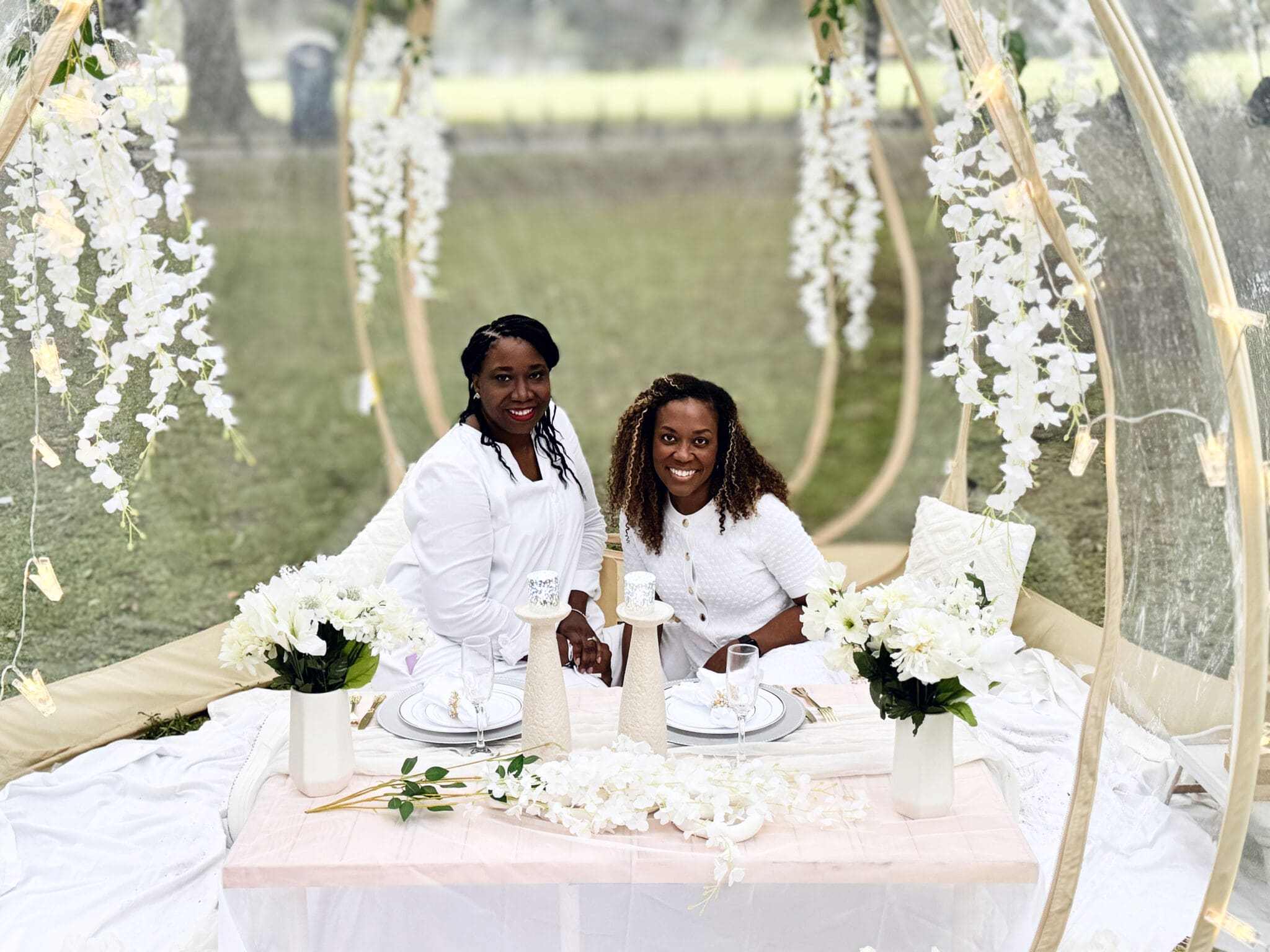 Dîner en Blanc guests celebrating in head-to-toe white in October
