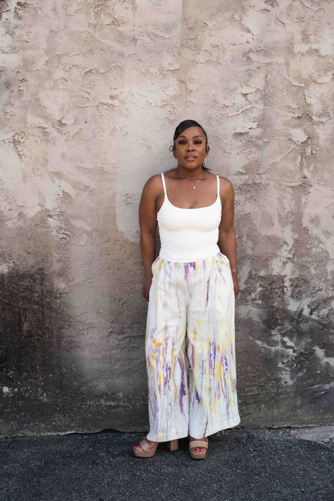 Dr. Shontae Buffington styling the Seamwork Marett trousers made from Parisian upholstery fabric with a neutral tank