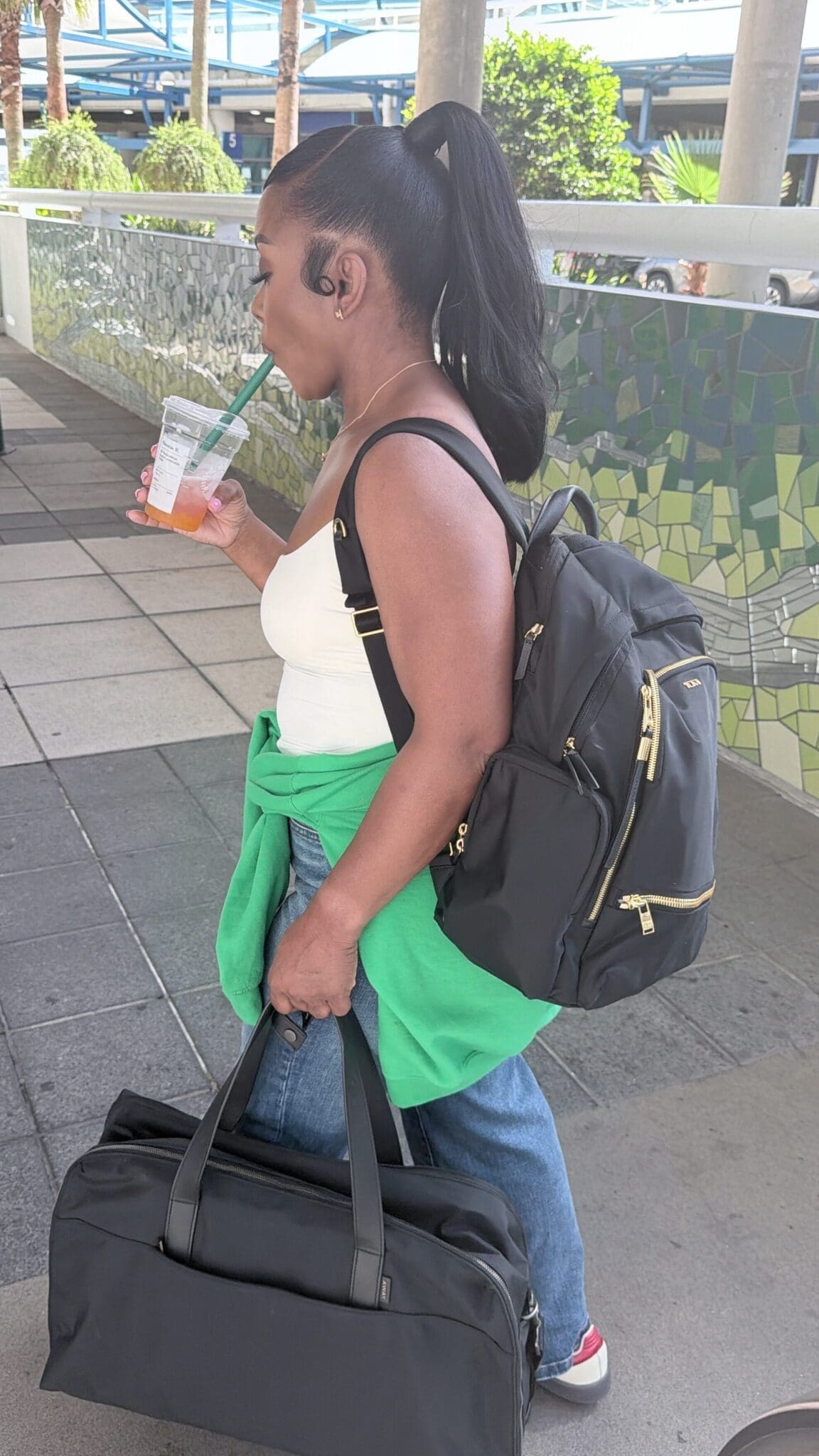 Side profile of Away Weekender carry on luggage system during travel