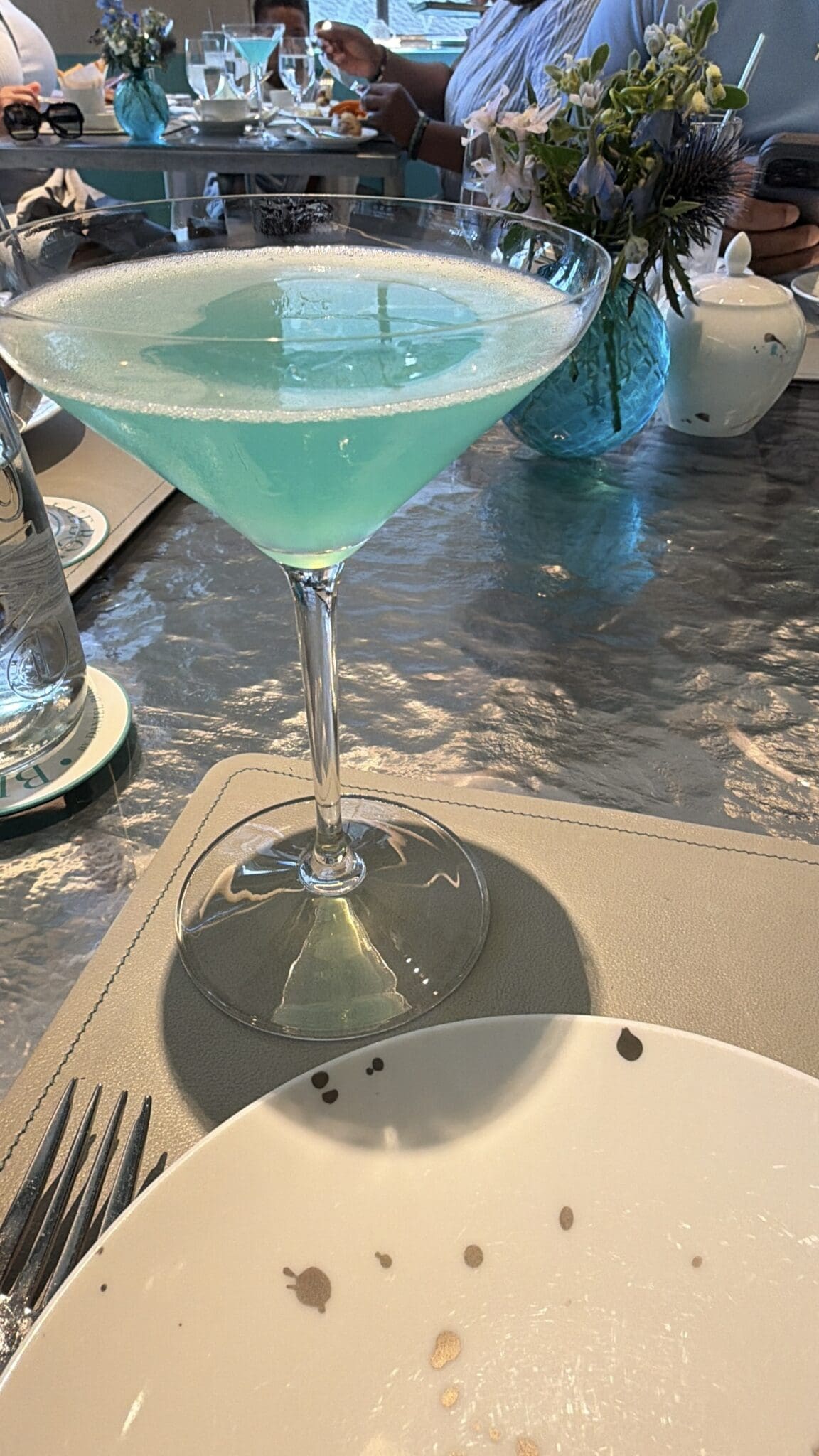 Bespoke cocktails and signature glassware at The Blue Box Cafe